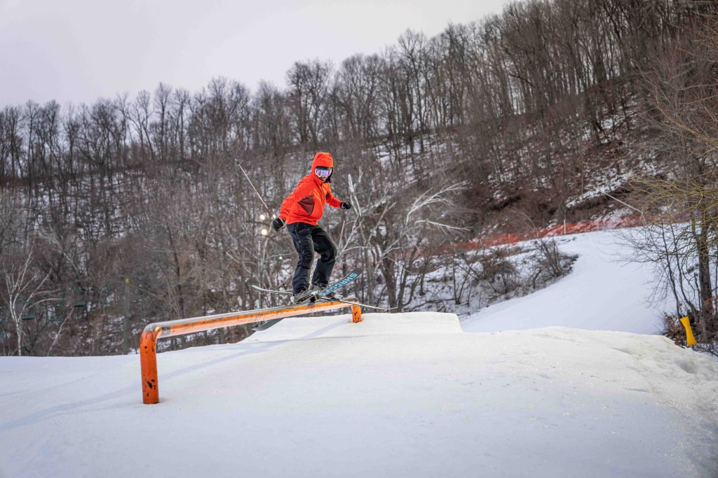 skier doing trick in terrain park