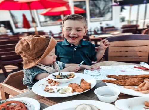 Kids laughing with food