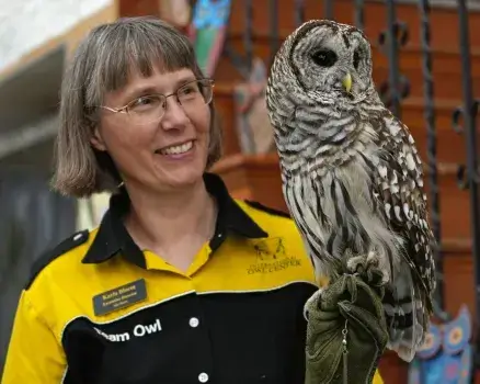 image-woman-holding-owl