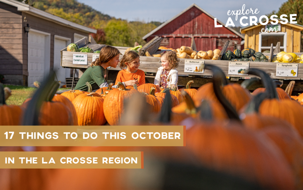 Kids playing with pumpkins at Hidden Trails Corn Maze