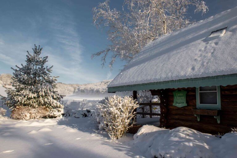 Cabin in the snow at Justin Trails