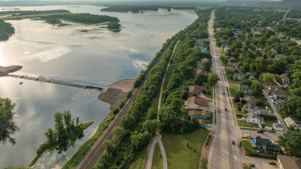 A shoreline neighborhood adjacent to a lake is seen from an aerial view in beautiful La Crosse, Wisconsin.