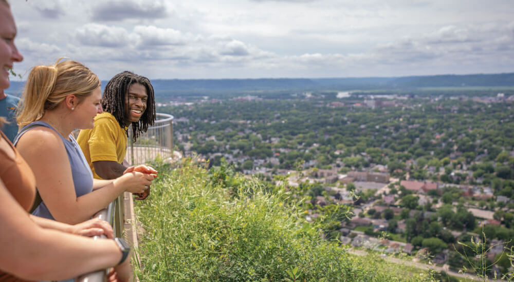 people overlooking La Crosse from a walkway