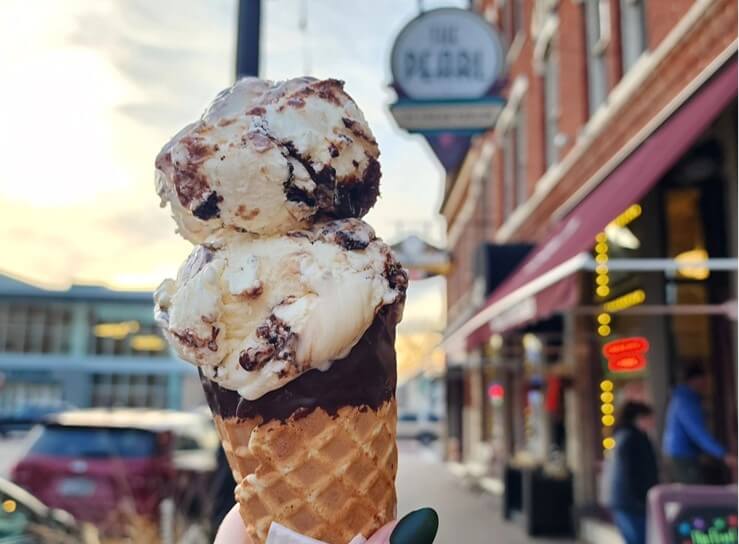 ice cream cone in front of the pearl
