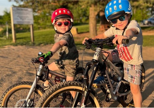 kids on bikes smiling