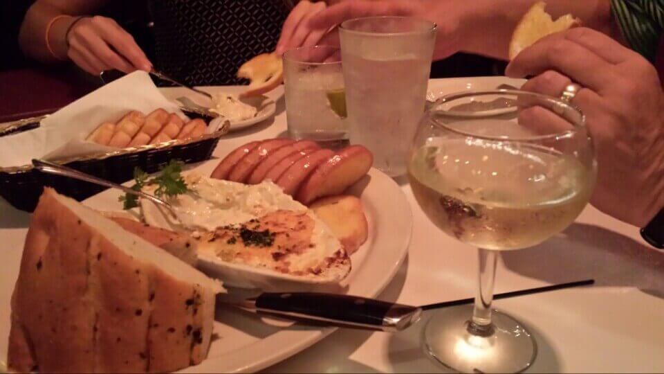 image-hands-taking-food-from-tab;le