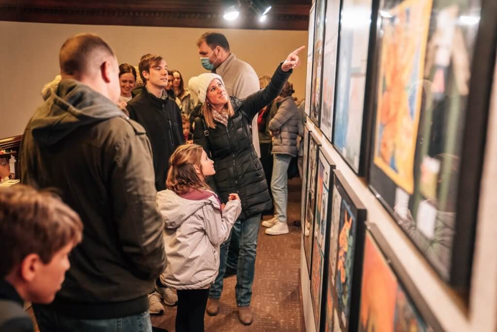 image-woman-pointing-at-art