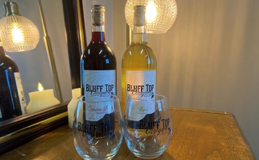 2 Wine Bottles with Glasses