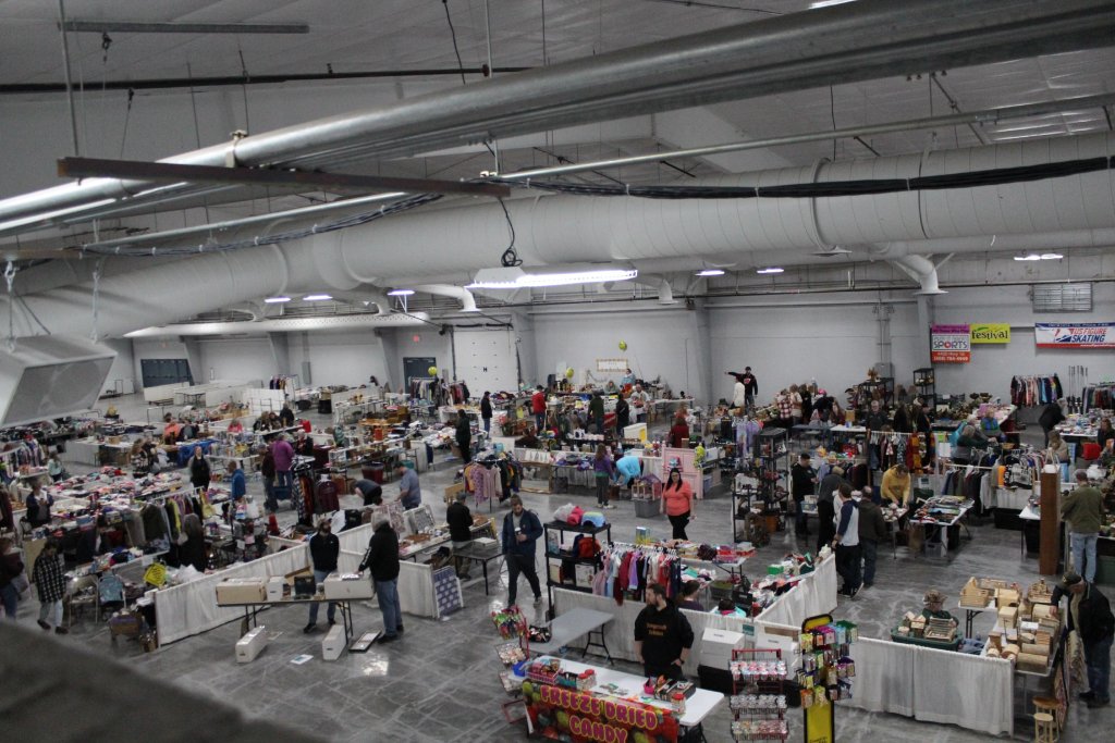 a large room with many people in it