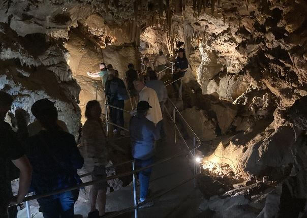 a group of people in a cave