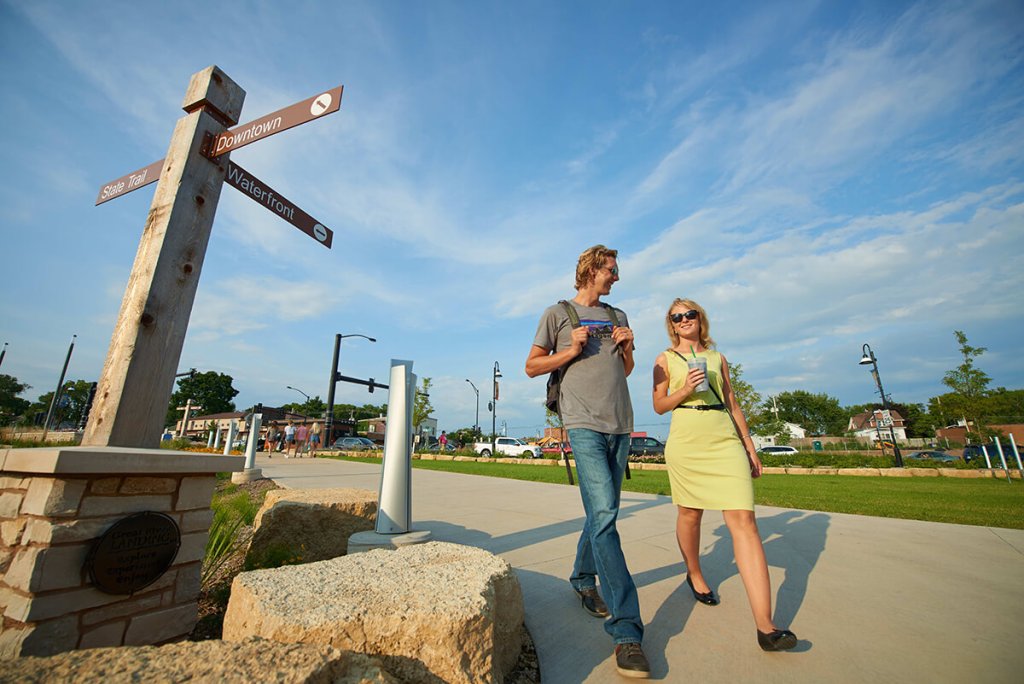 Two people walking in downtown La Crosse