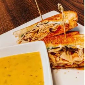 a plate of food and a bowl of soup