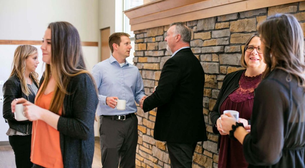 various people having conversations