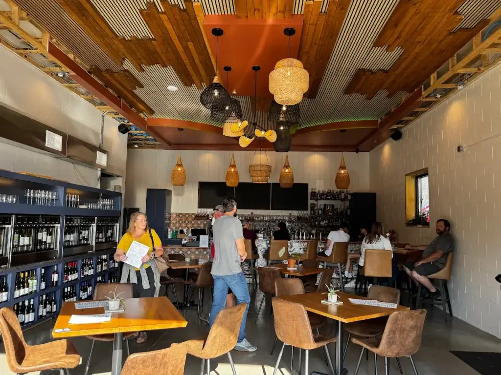 Lush Wine Bistro's interior with wine wall
