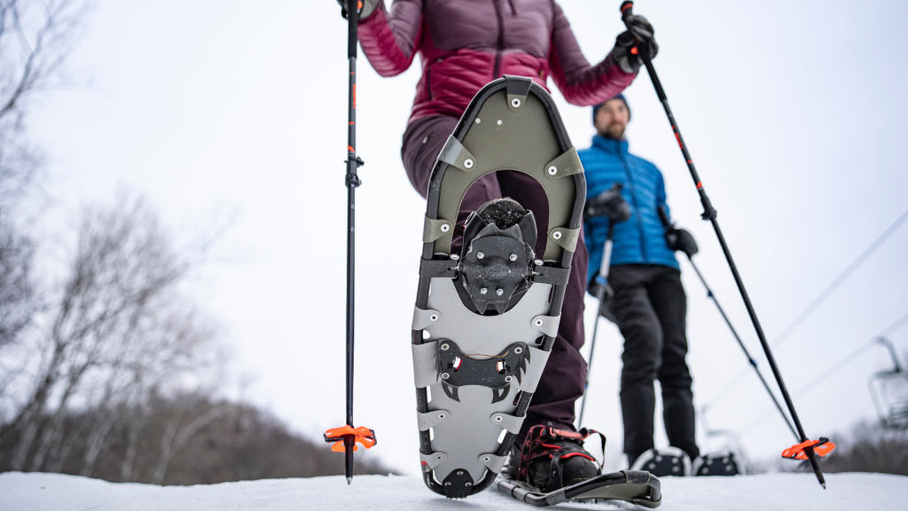 A couple snowshoeing in the winter