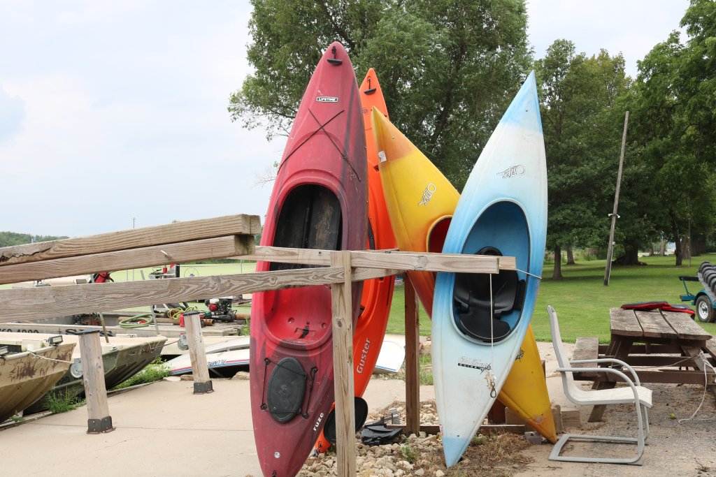 kayaks propped up at schafers river rentals