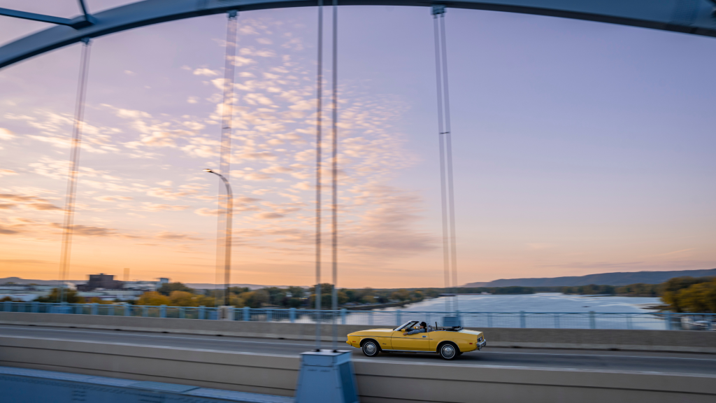 Car driving on the Big Blue Bridge