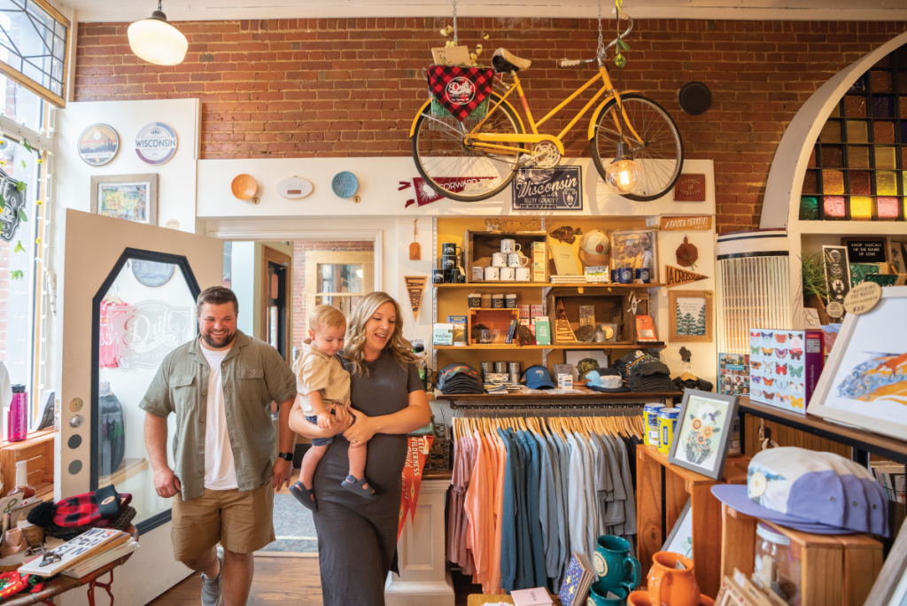 Family shopping in a cozy store in historic downtown la crosse wisconsin of the driftless region.