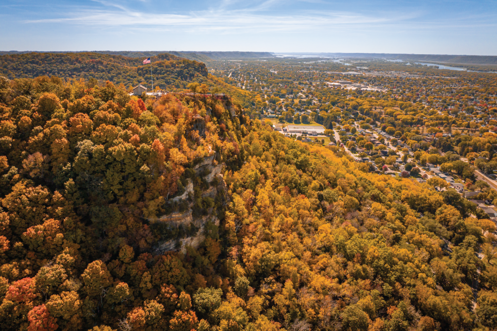 Experience fall in La Crosse, Wisconsin with scenic foliage on Grandad Bluff, Driftless hiking, Great River Road drives, apple orchards, festivals, local flavors, and more.