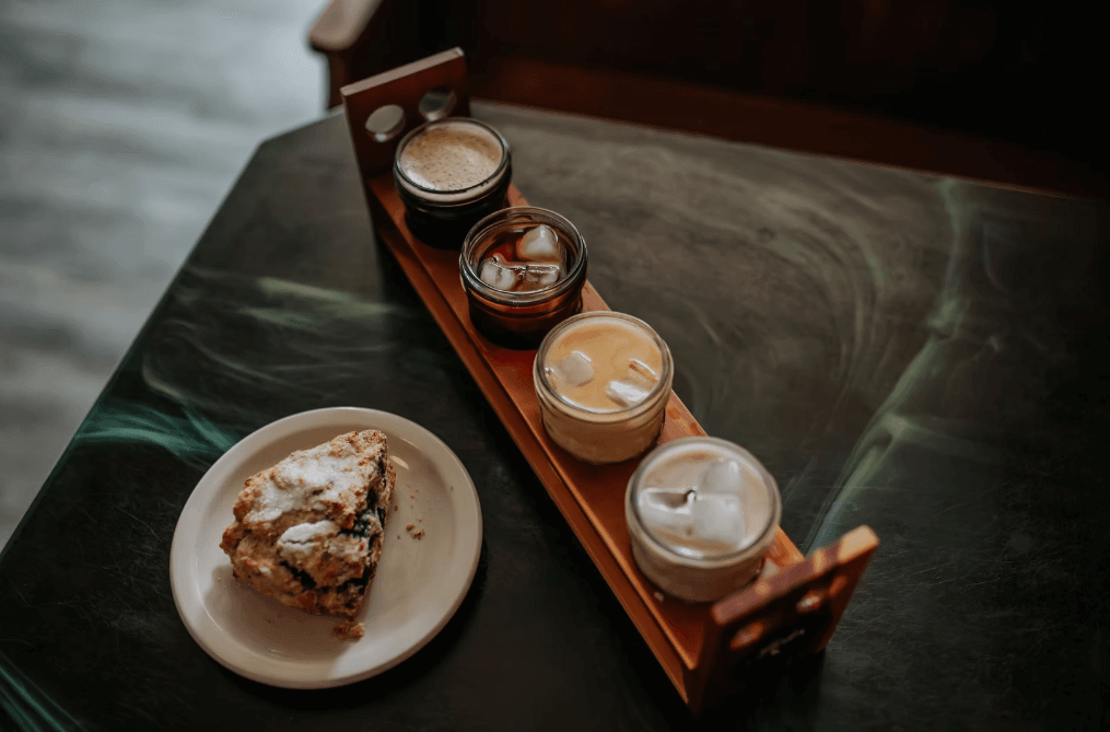 a scone and coffee flight at Jules Coffee House