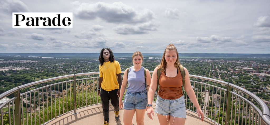 parade magazine logo with people at grandad bluff in the background