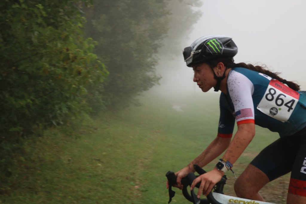woman competing in gravel cycling race